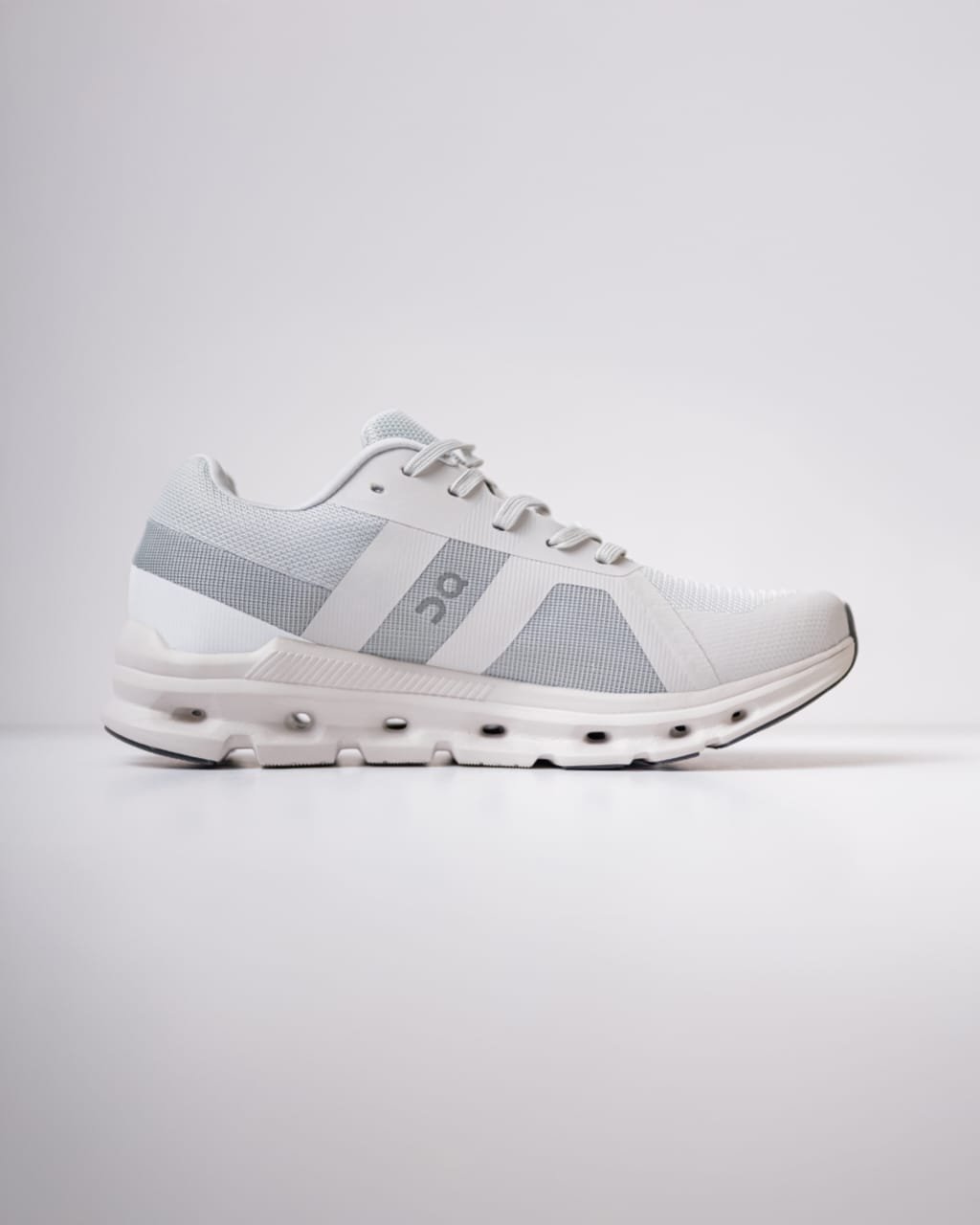 Running Cloudrunner sneakers in white